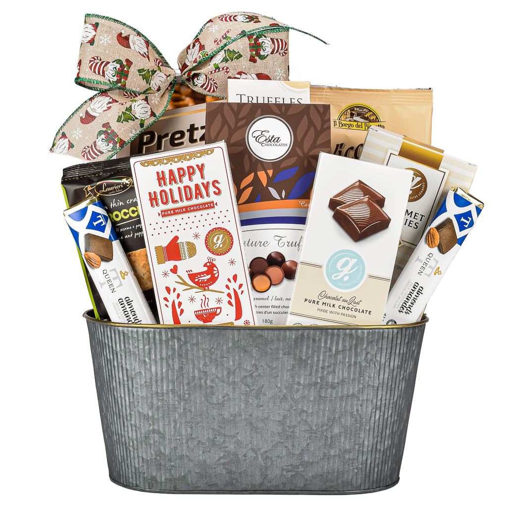 Gift basket with various chocolate bars and confections in a metal bucket with a Christmas Bow